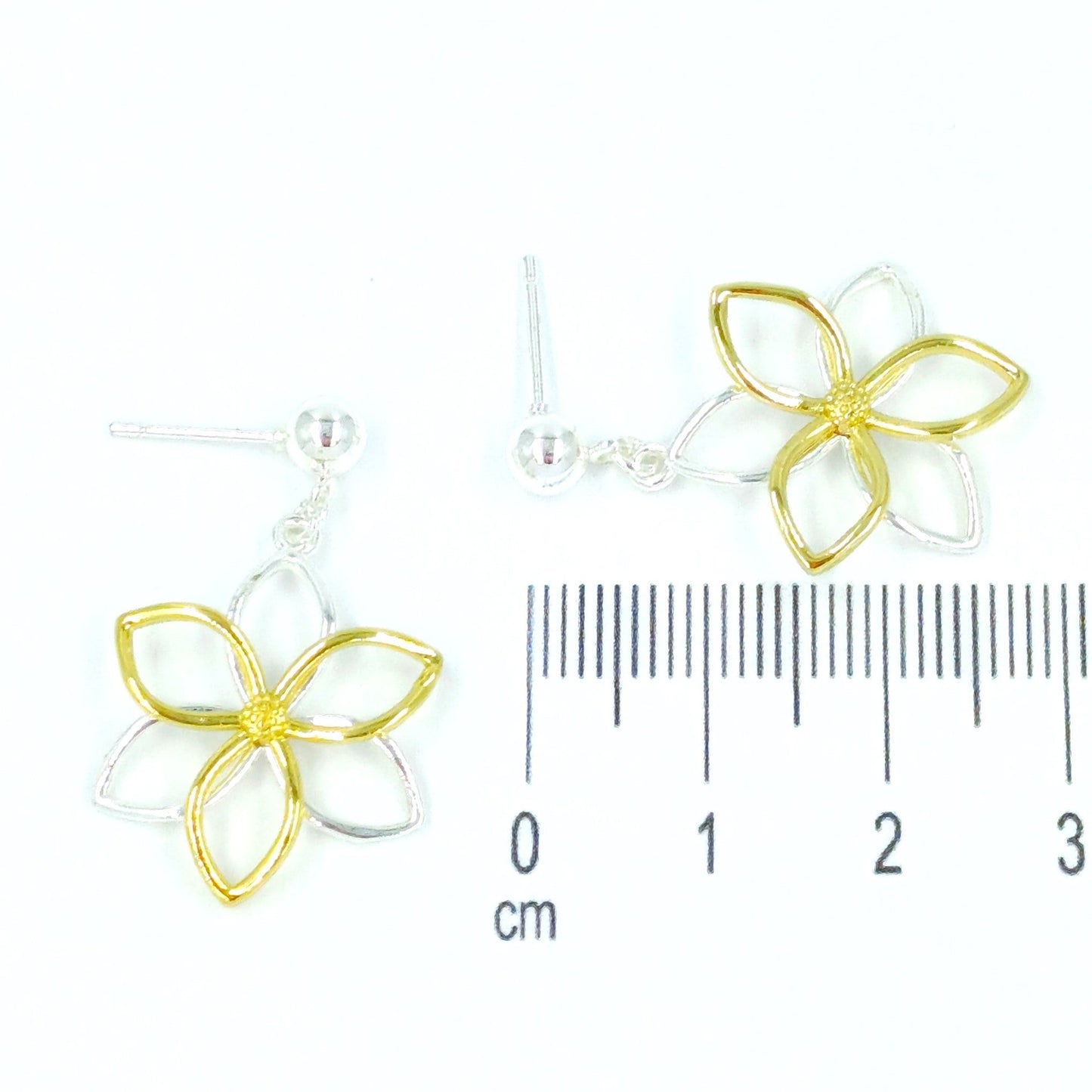 Arete silueta flor 2 oros
