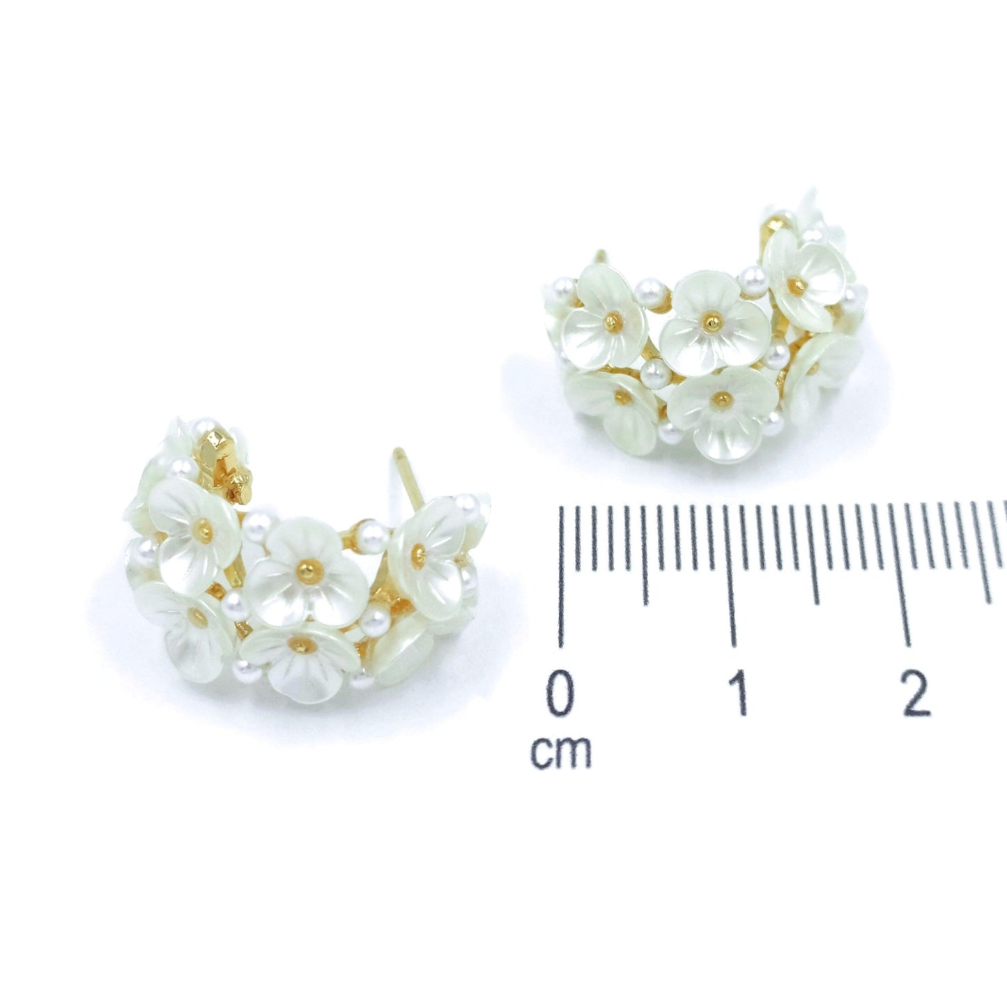 Arete flores perlas