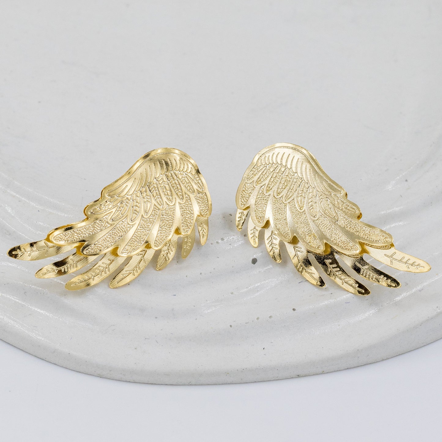 Arete bronce alas doble 3.5cm