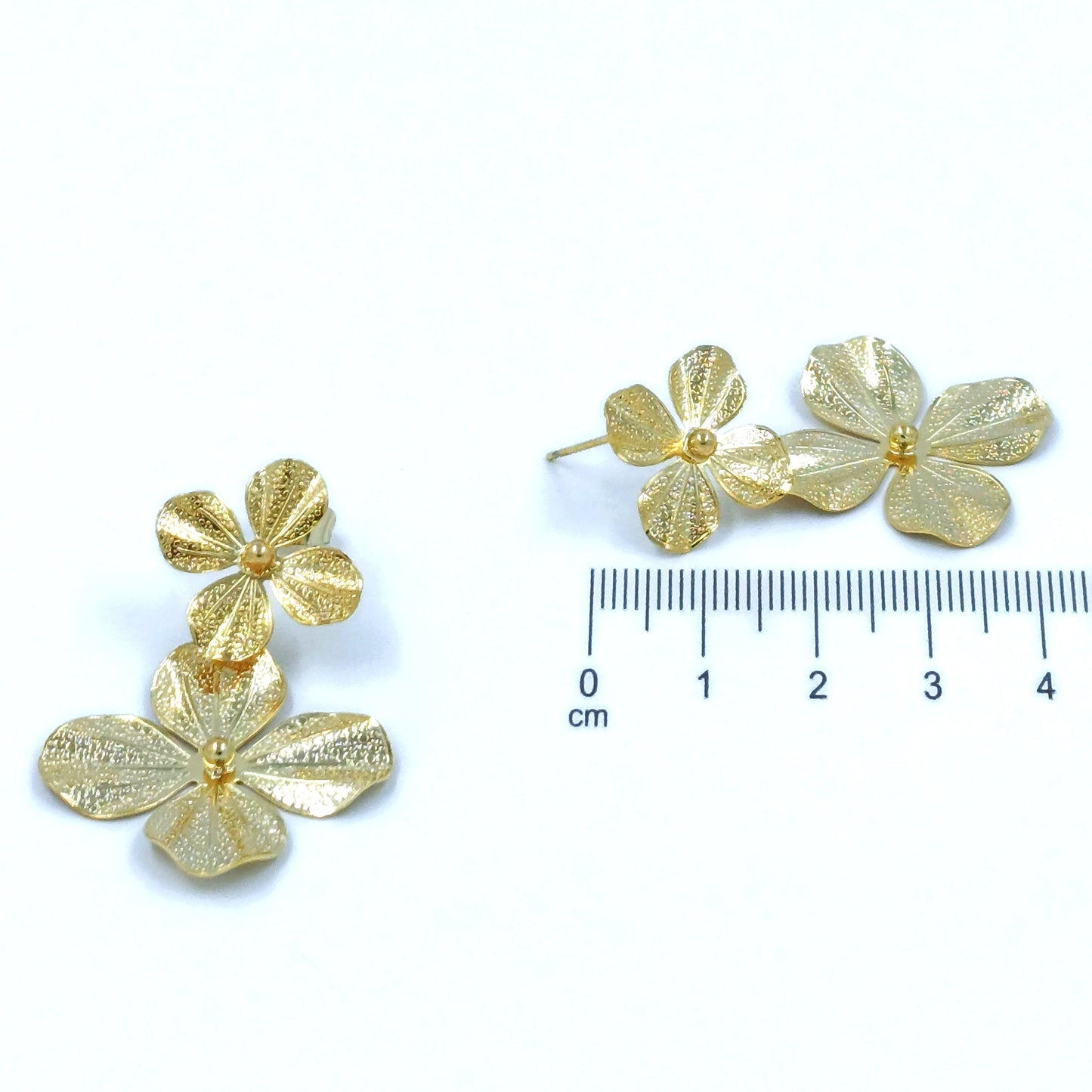 Arete bronce maxi flor