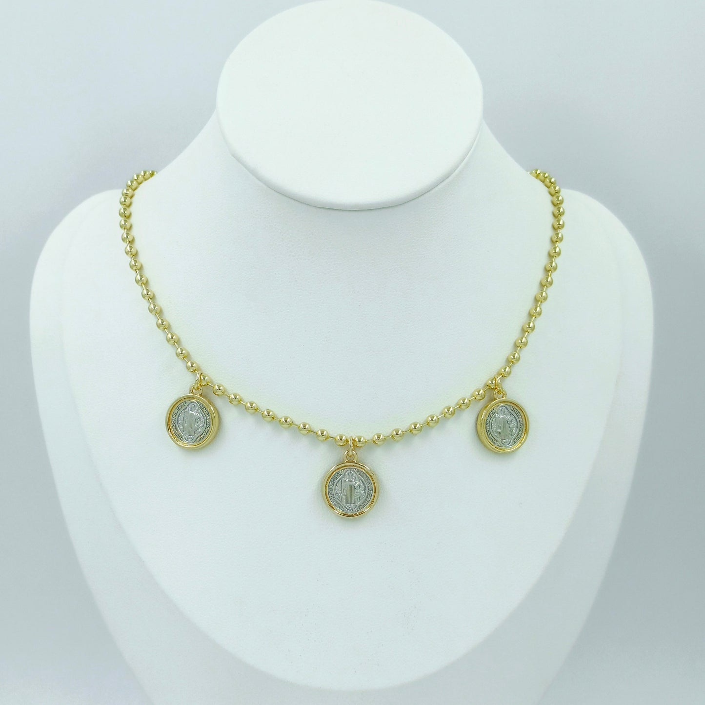 Dúo dijes san Benito