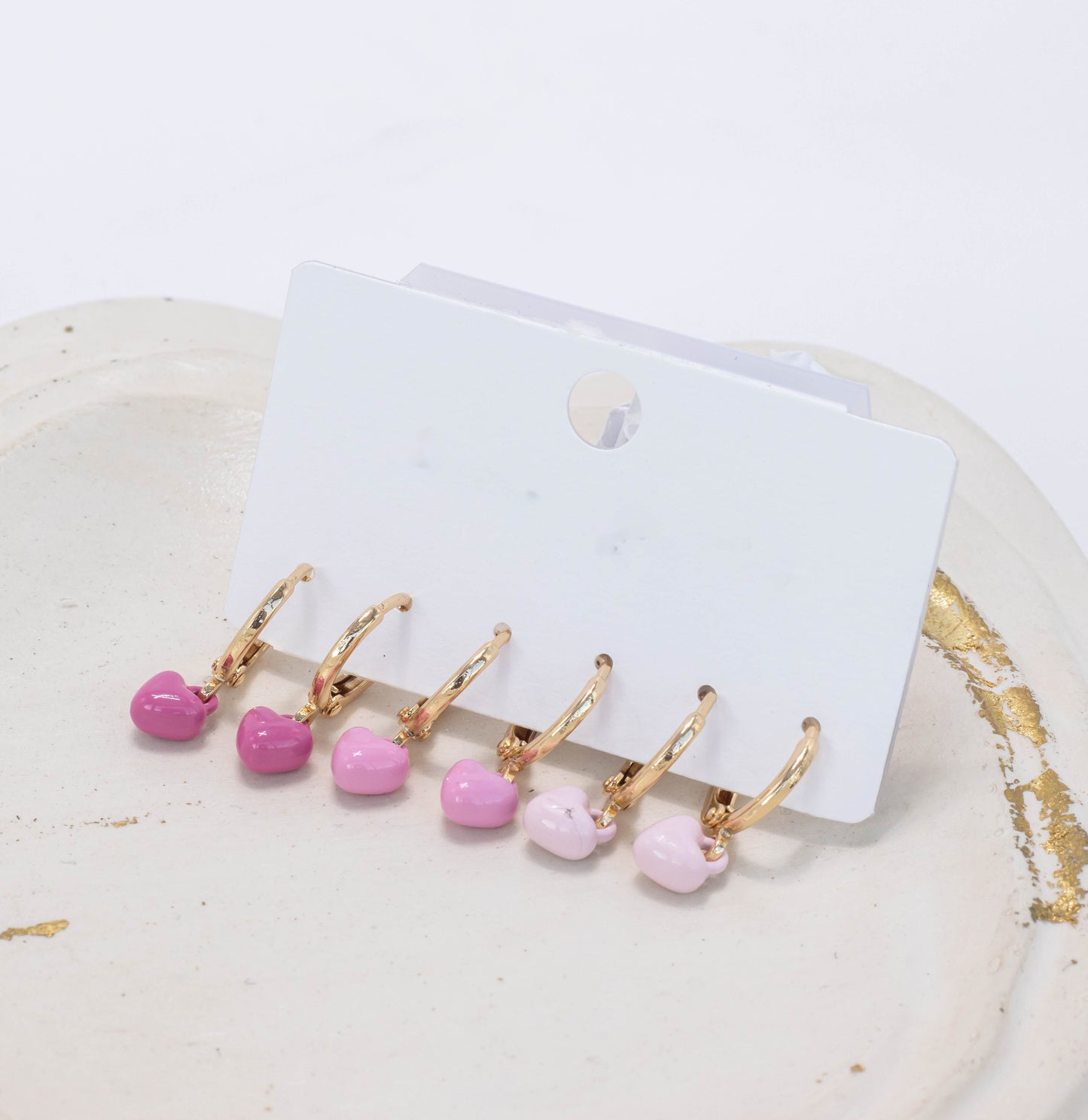 Orejera set corazones rosa