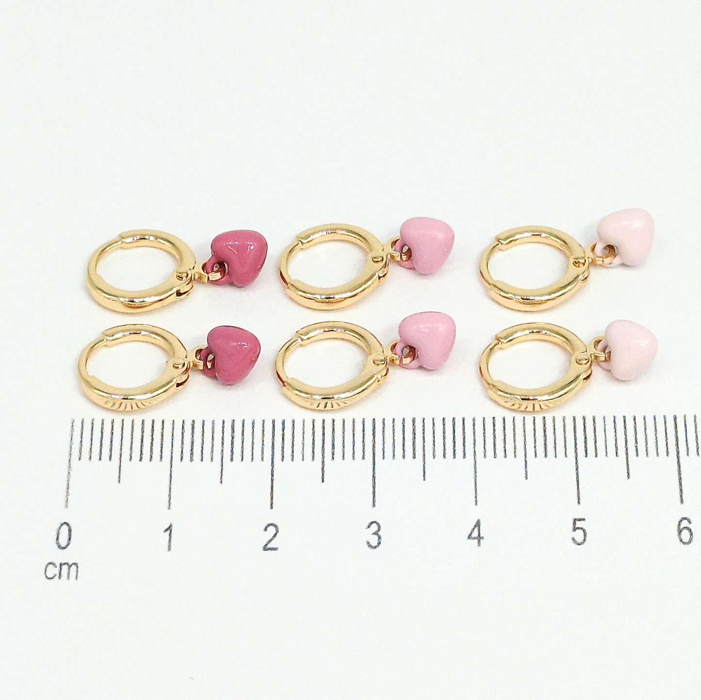 Orejera set corazones rosa