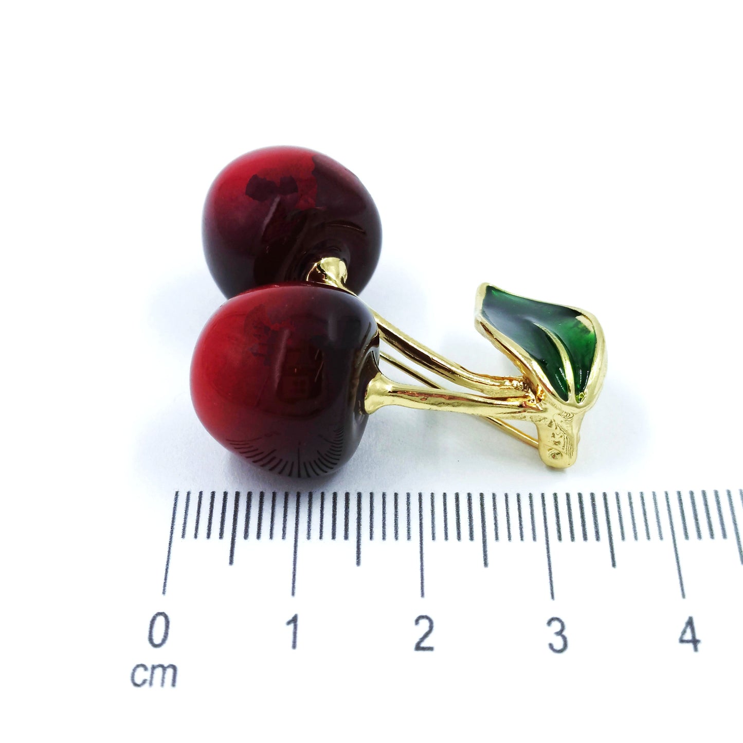 Broche cereza doble