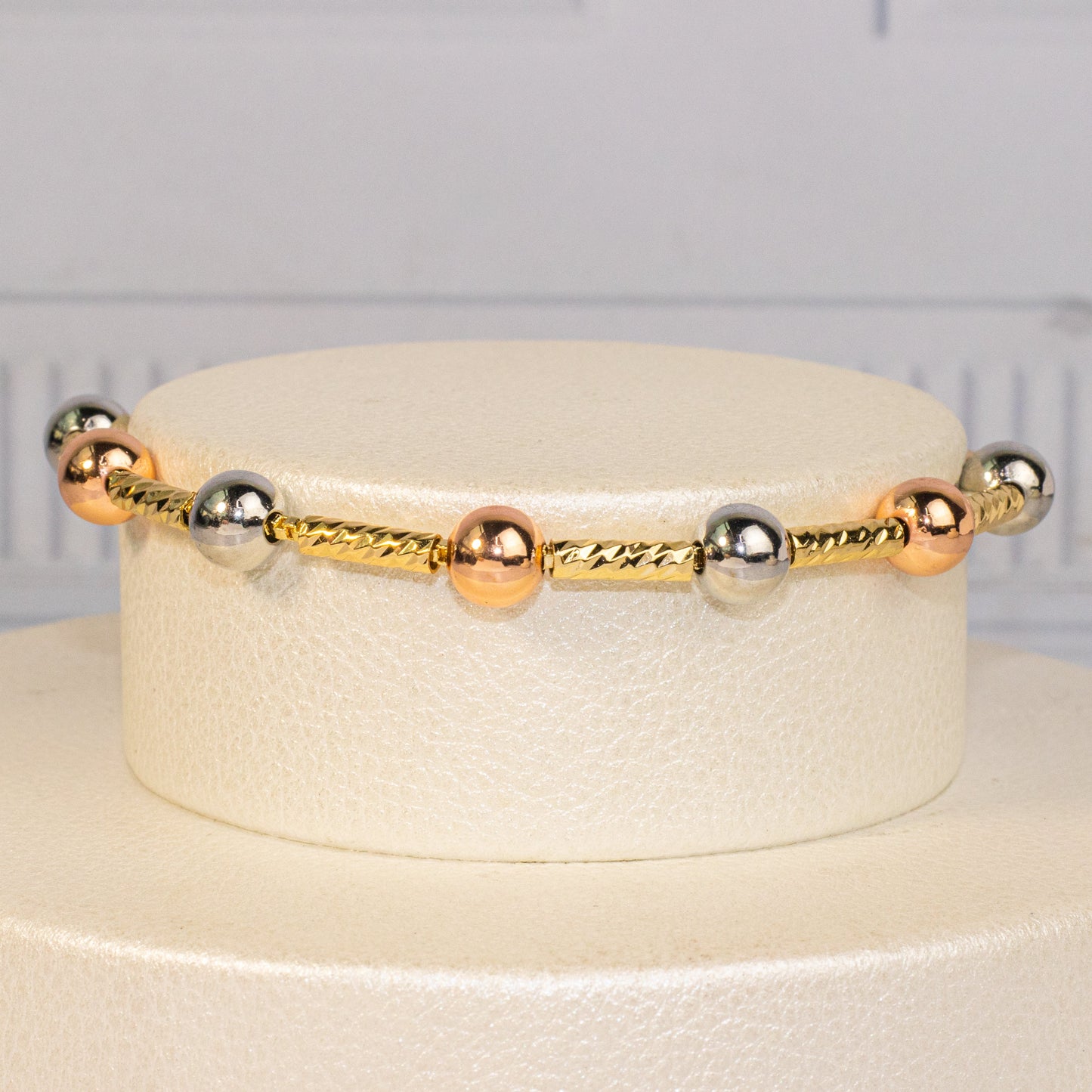 Pulsera balines dos oros