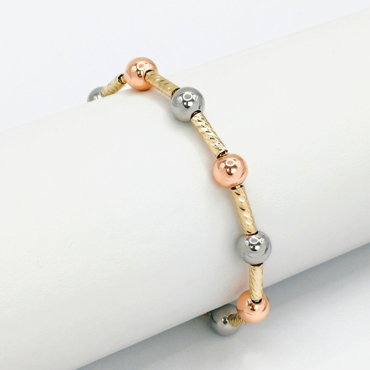 Pulsera balines dos oros