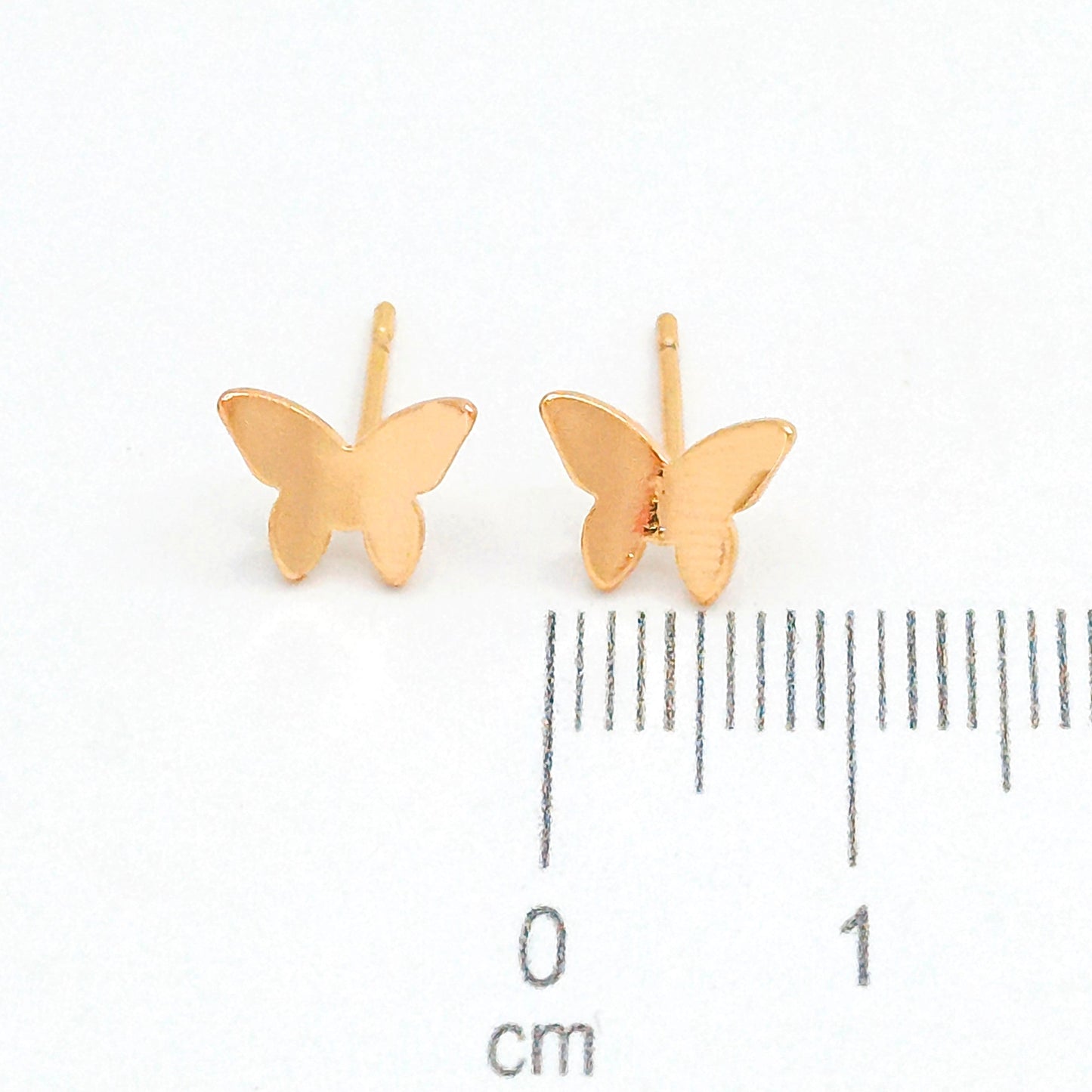 Topo mariposa cóncava