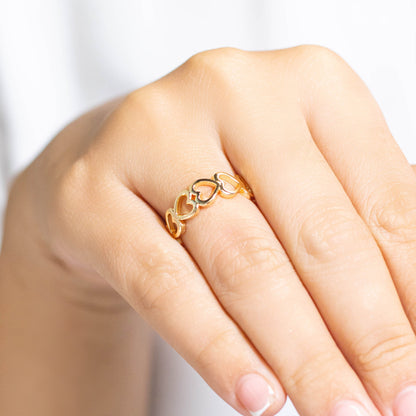 Anillo silueta corazones