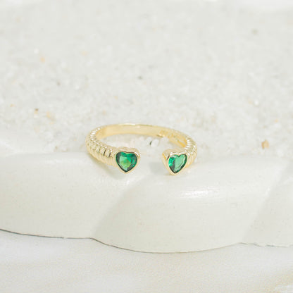 Anillo corazones esmeralda