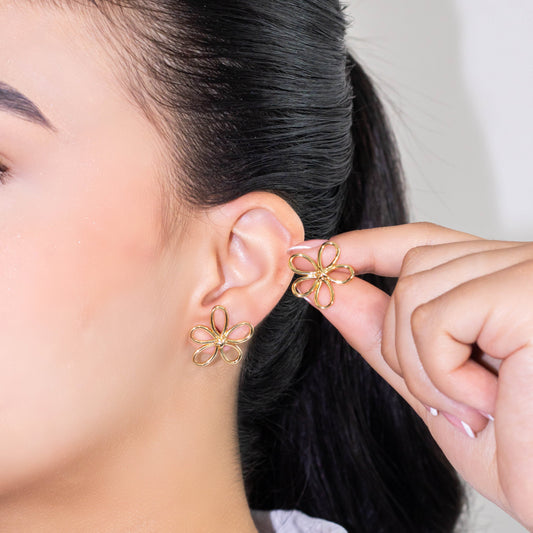 Arete flor silueta