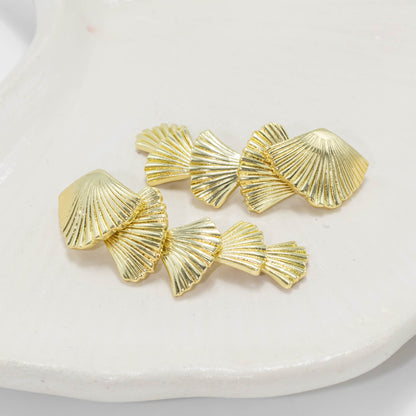 Arete lluvia de conchas