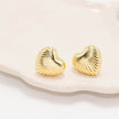 Arete corazon tallado