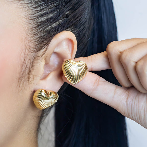 Arete corazon tallado
