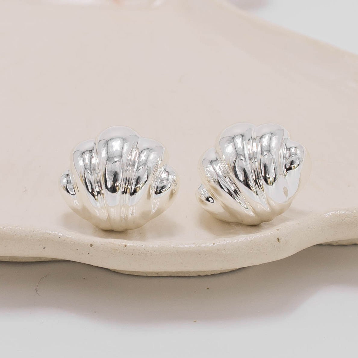 Arete concha baño de plata