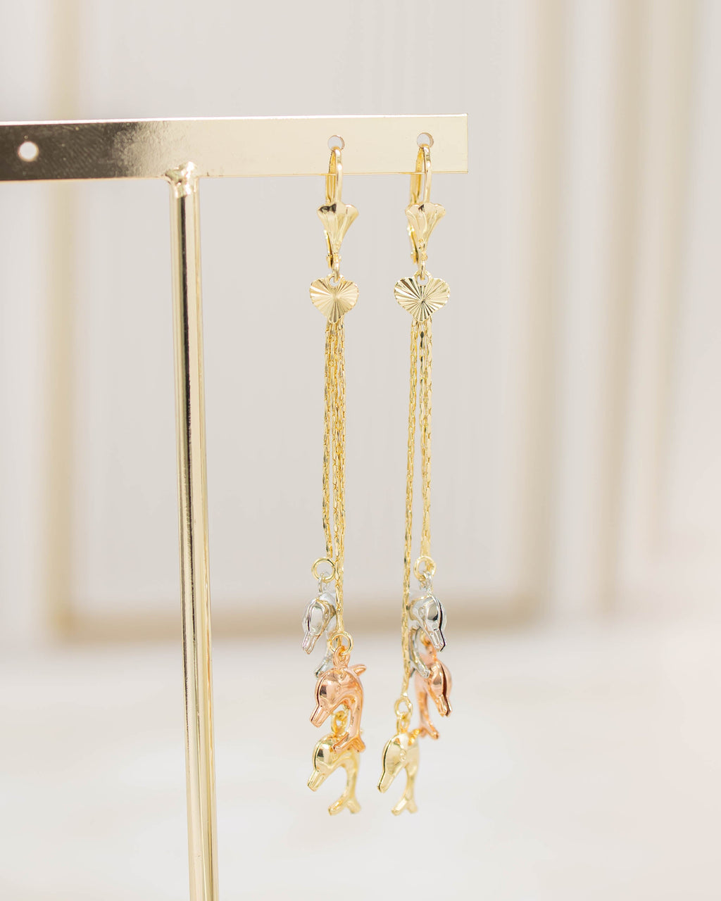 Arete 3 oros delfines