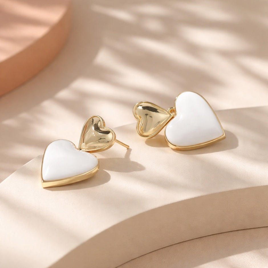 Arete corazón blanco
