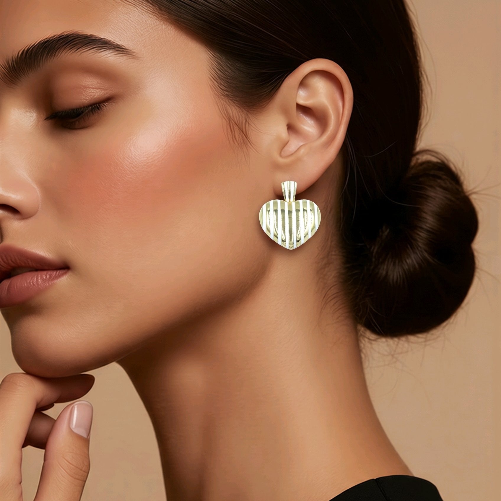 Arete corazón cebra blanco