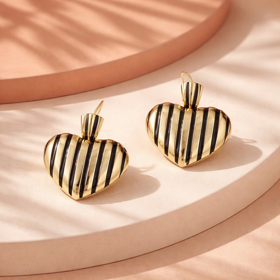 Arete corazón cebra negro