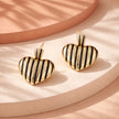 Arete corazón cebra negro