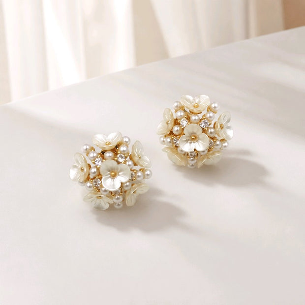 Arete flores perlas