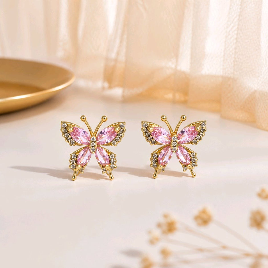 Arete mariposa rosa