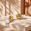 Arete flor perla