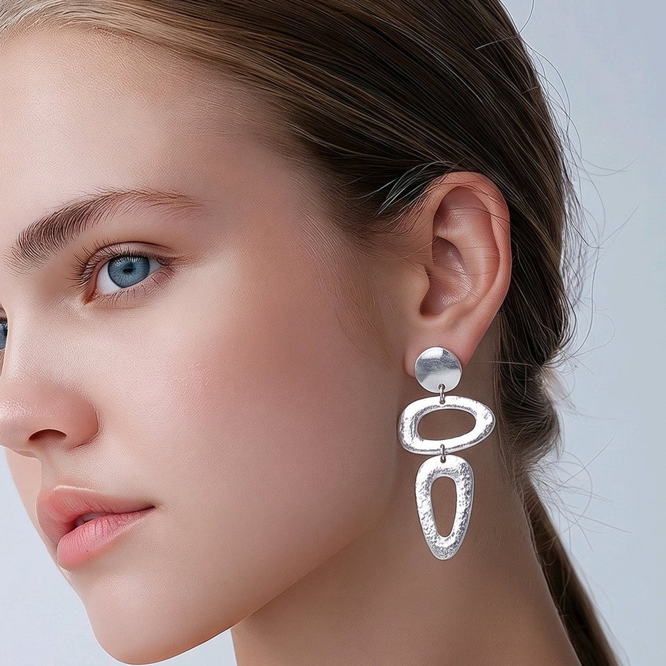 Arete figuras baño de plata