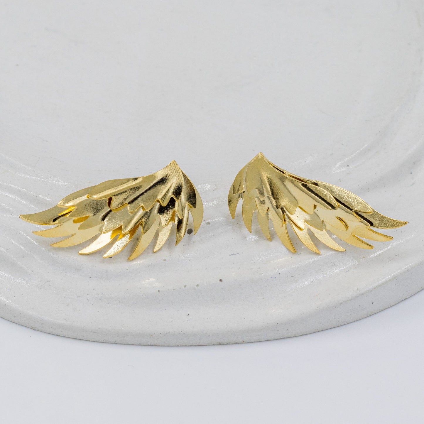 Arete bronce alas lisa 3cm