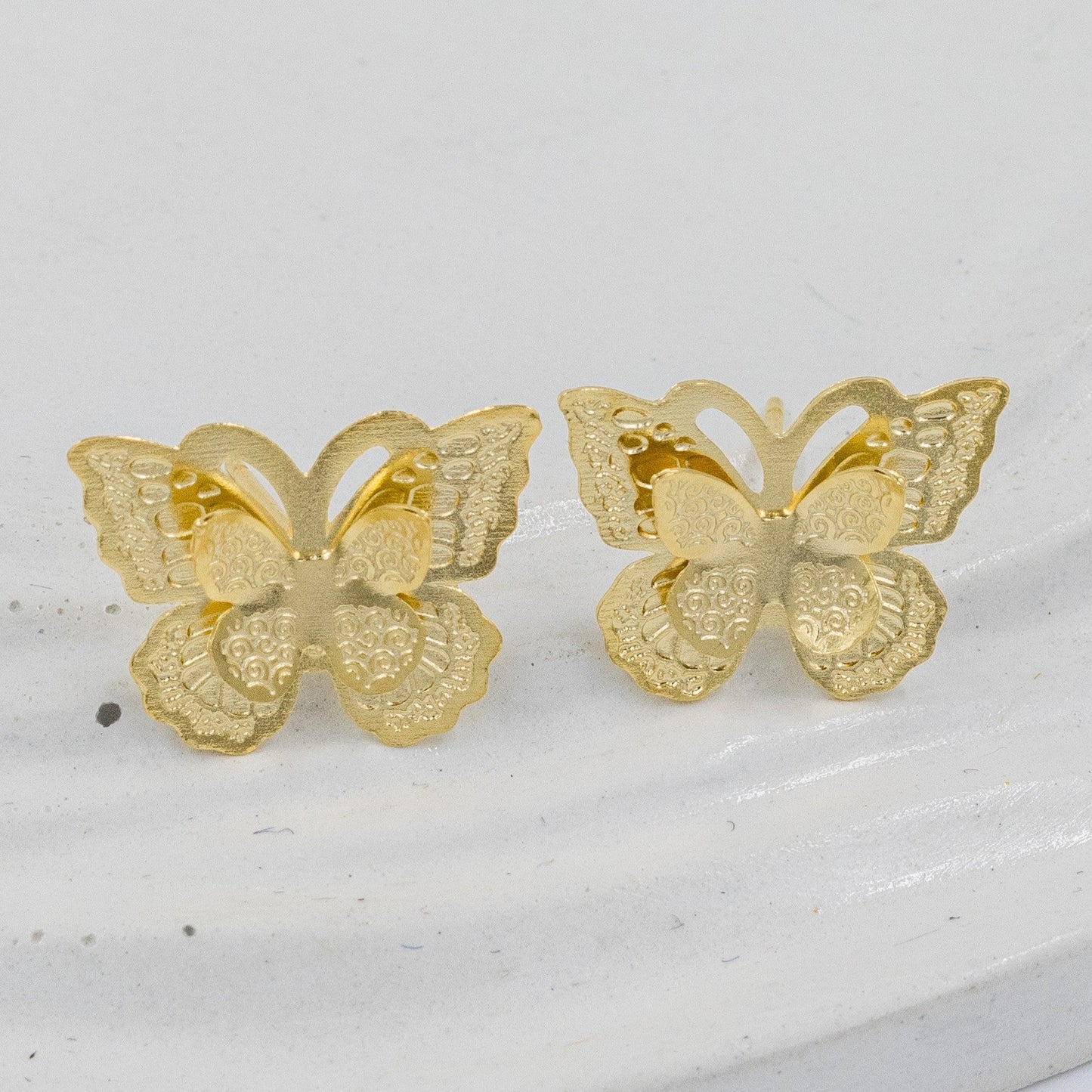 topo bronce mariposa doble 2cm
