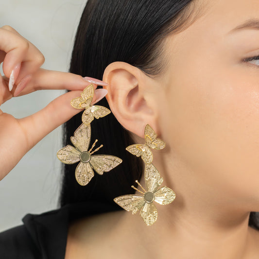 Arete bronce eslabones mariposas 7cm