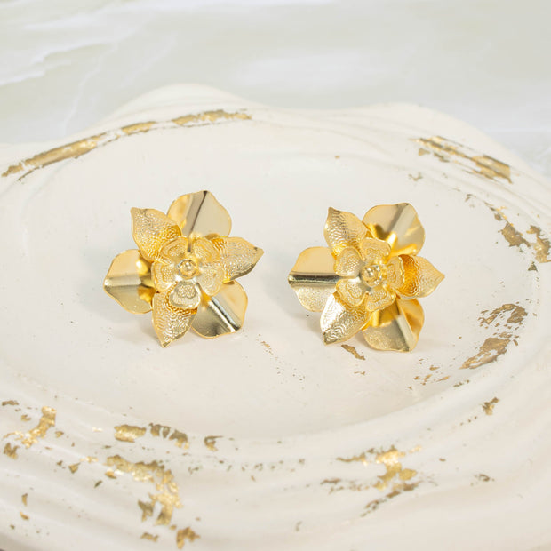 Arete bronce flor