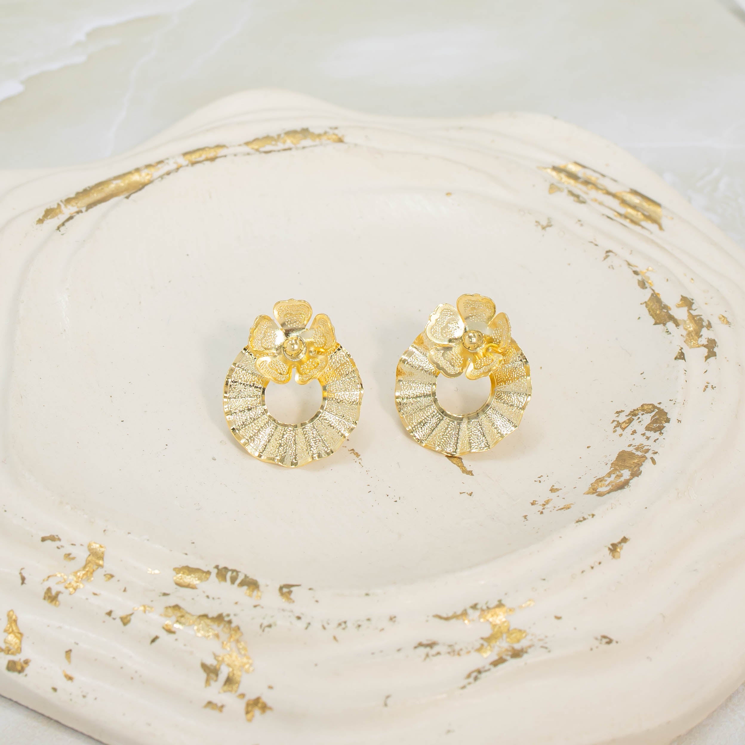 Arete bronce círculo flor