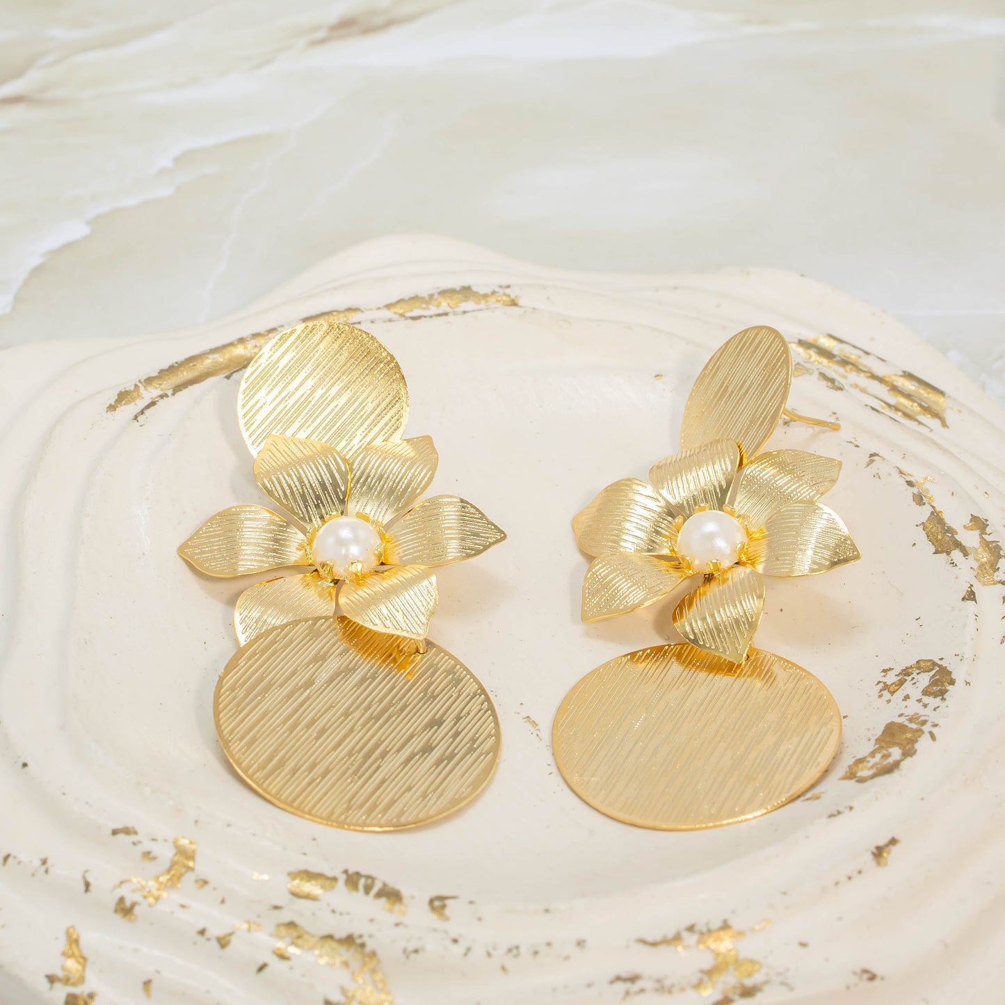 Arete bronce maxi flor círculos