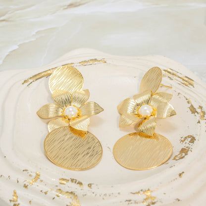 Arete bronce maxi flor círculos