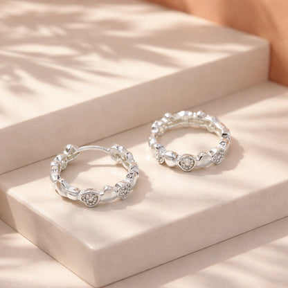 Candonga pequeña baño de plata corazones