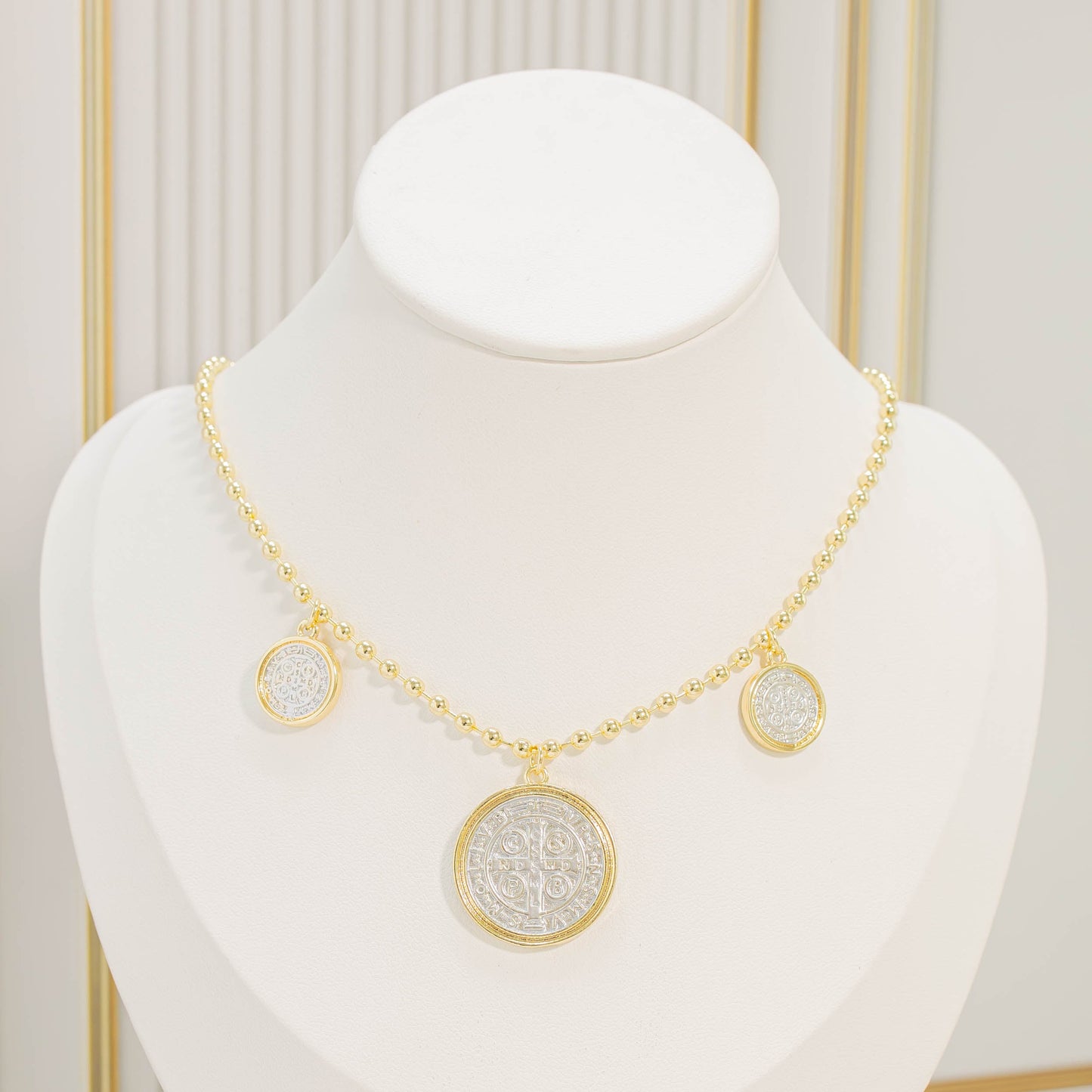 Dúo dijes san Benito