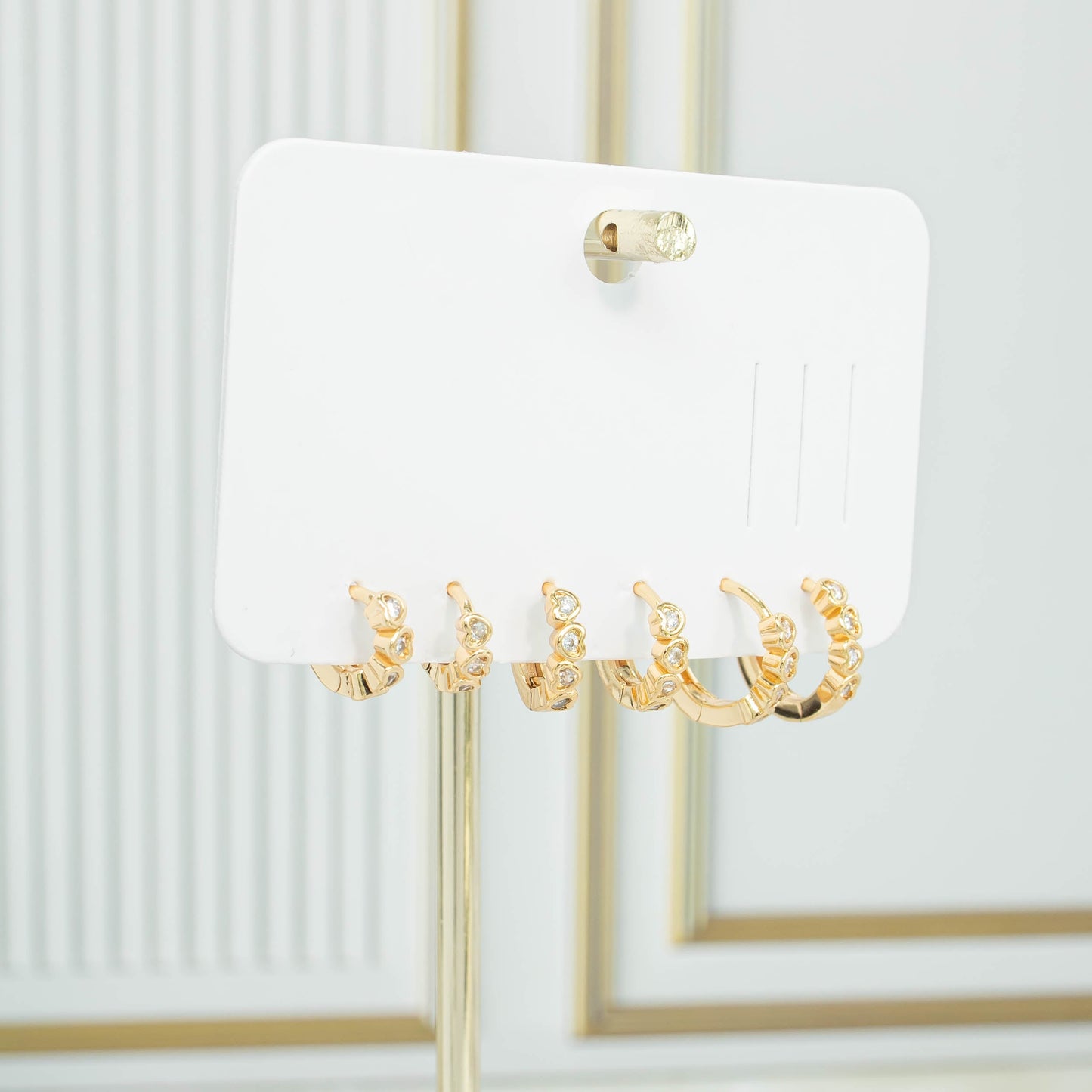 Orejera trío corazón zircones