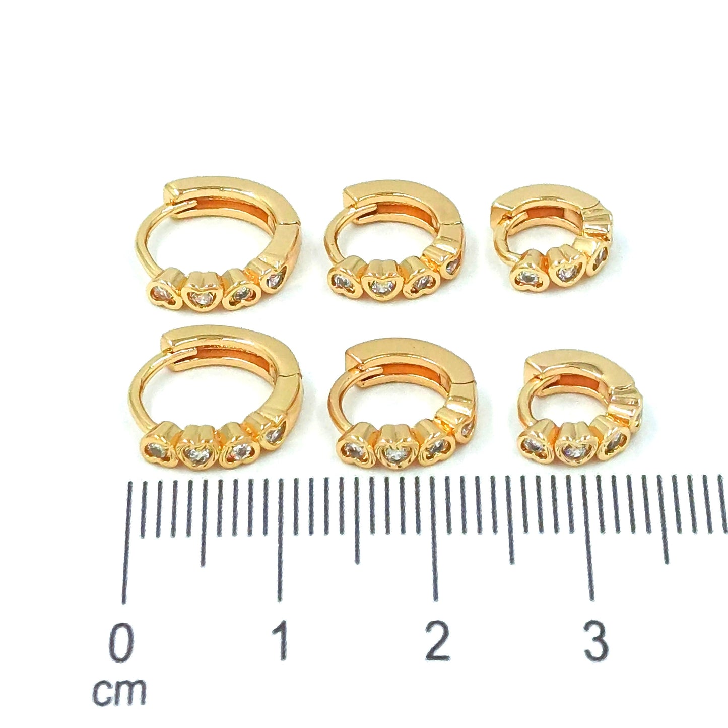 Orejera trío corazón zircones