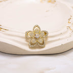 Broche flor microzircón