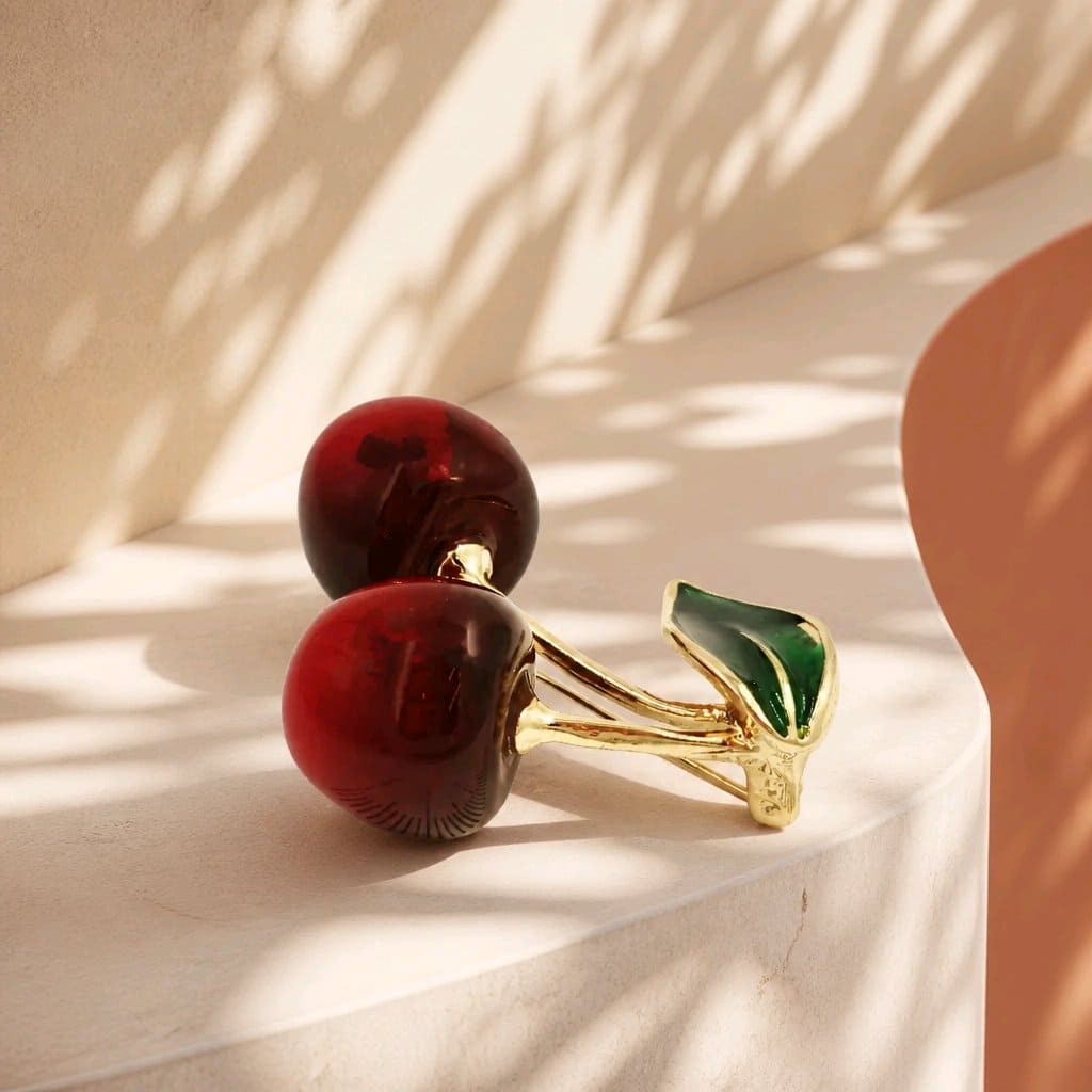 Broche cereza doble