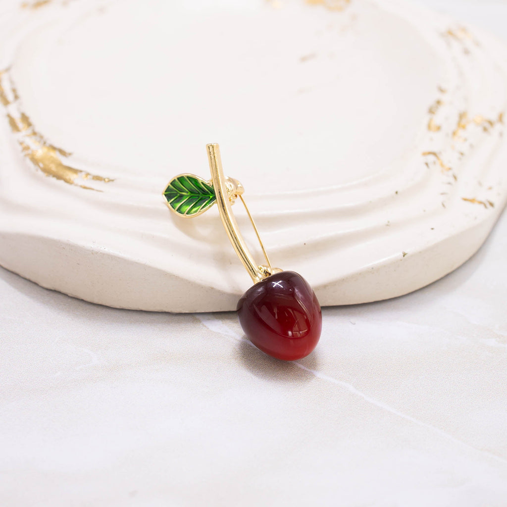 Broche cereza