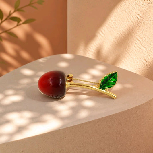 Broche cereza