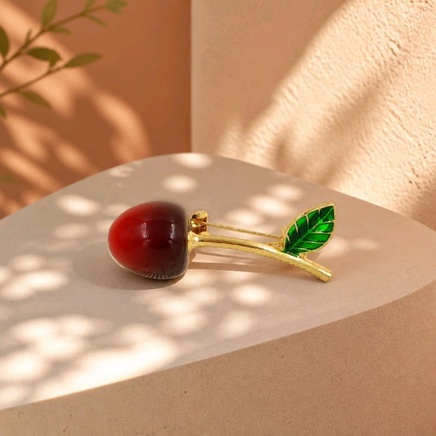 Broche cereza