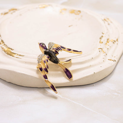Broche golondrina