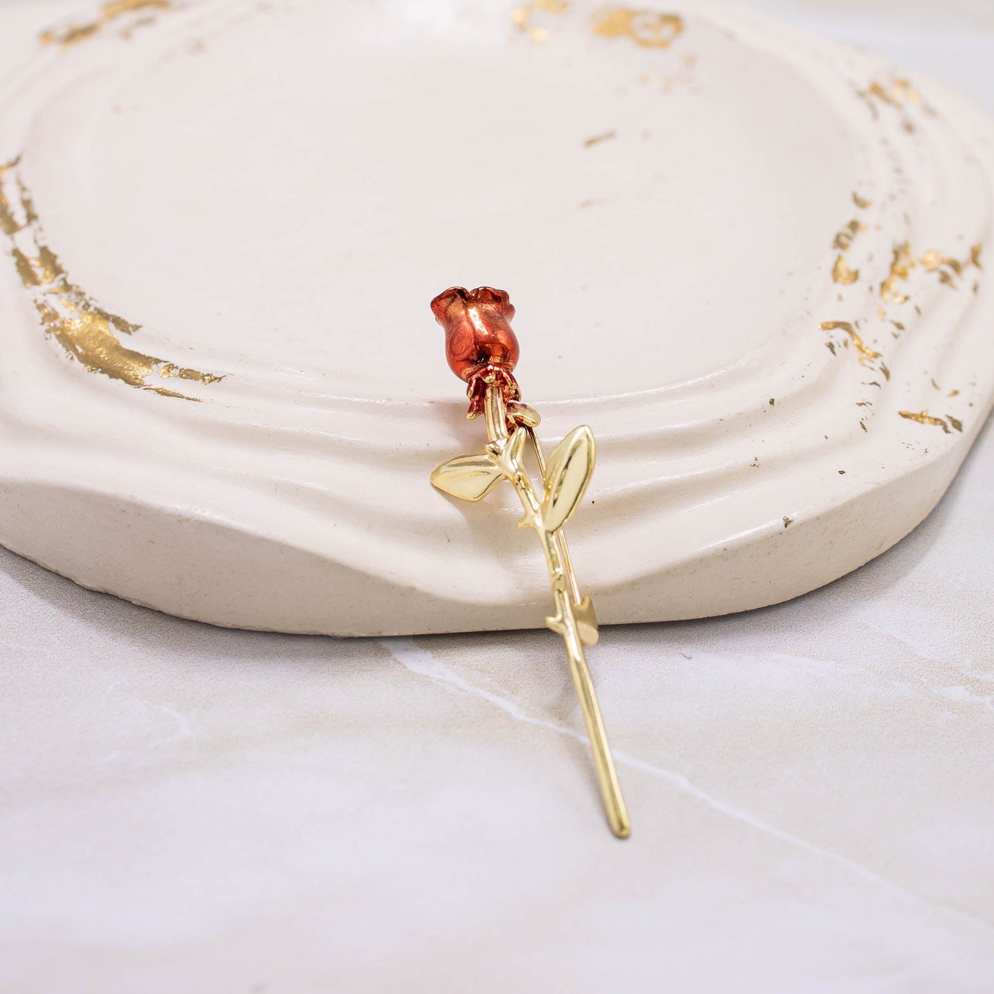 Broche rosa