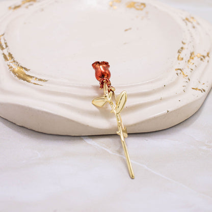 Broche rosa