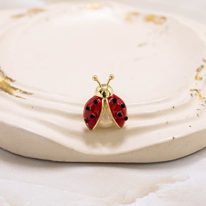 Broche mariquita
