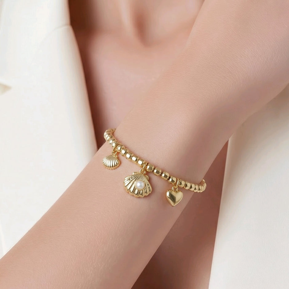 Pulsera aro conchas