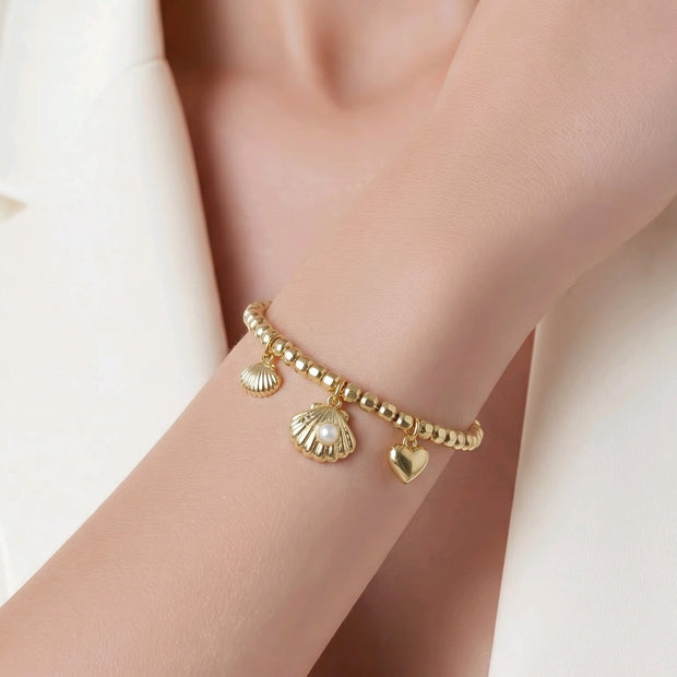 Pulsera aro conchas