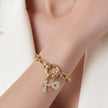 Pulsera tifany corazón cruz